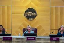 Mayor Michelle Romero, center, Councilwomen Monica Larson, left, and Carrie Cox, right, watch a ...