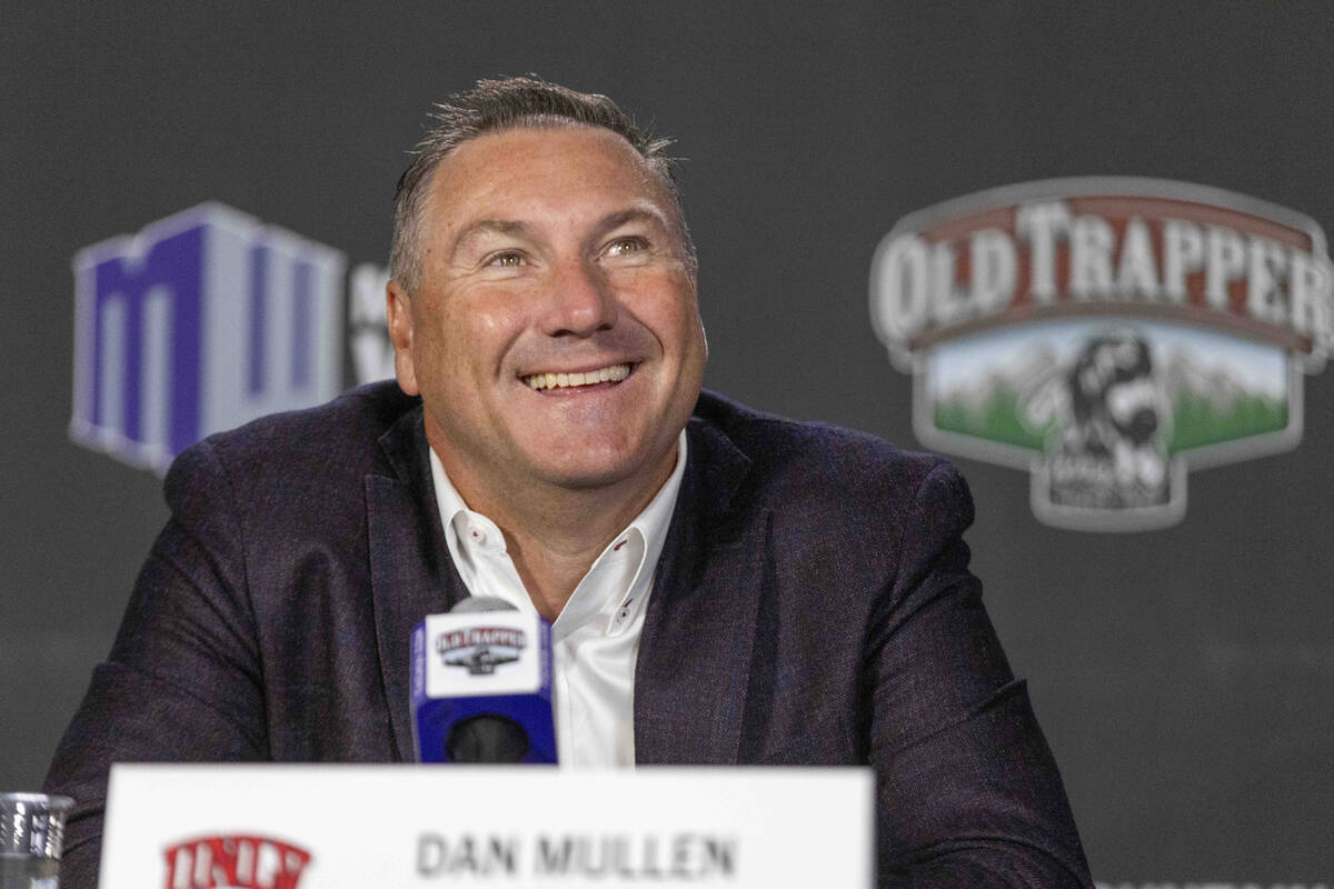 UNLV football head coach Dan Mullen smiles as he takes questions at a news conference during Mo ...