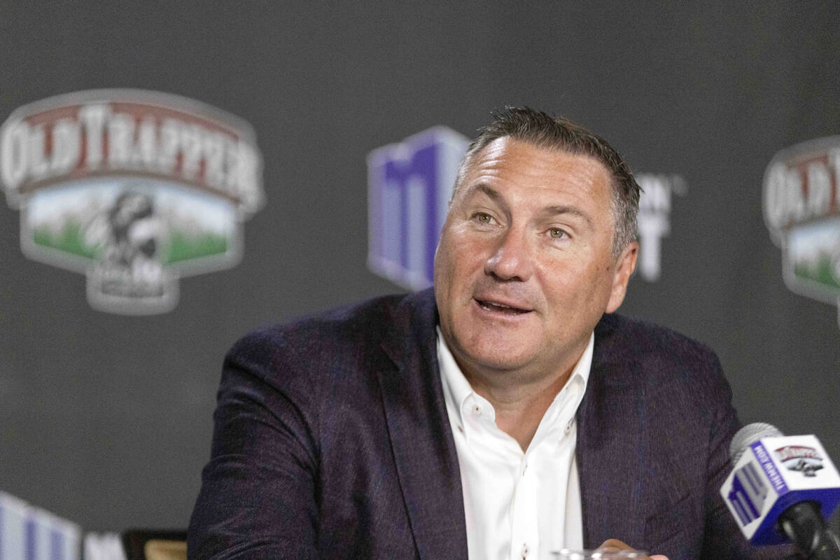 UNLV football head coach Dan Mullen answers questions at a news conference during Mountain West ...