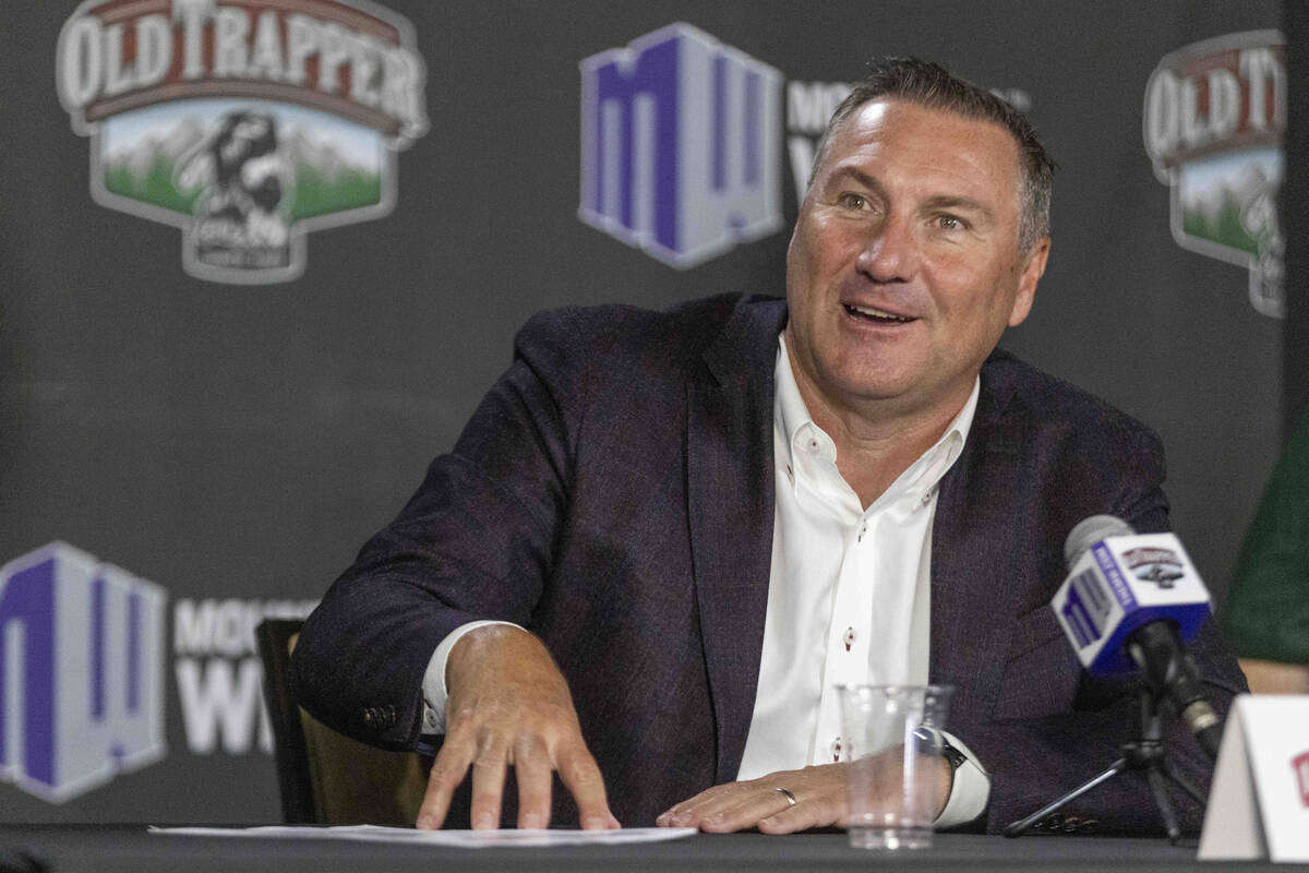 UNLV football head coach Dan Mullen answers questions at a news conference during Mountain West ...