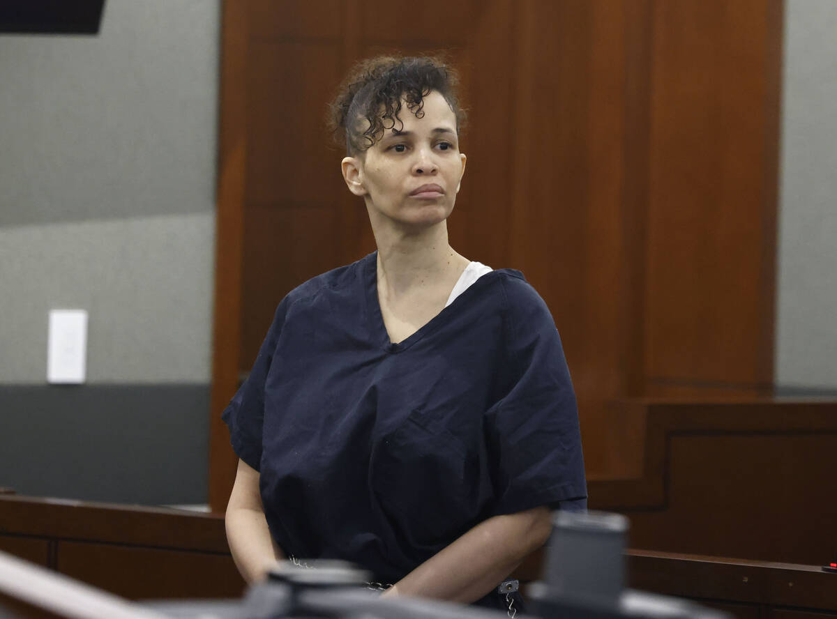 Devyn Michaels, who is accused of killing her boyfriend protests her innocence at a hearing at ...