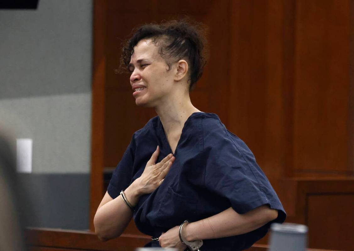 Devyn Michaels, who is accused of killing her boyfriend protests her innocence at a hearing at ...