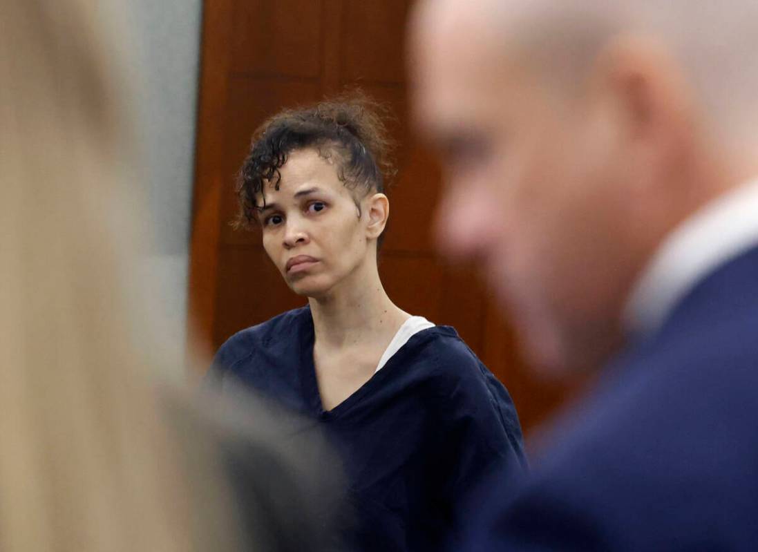 Devyn Michaels, who is accused of killing her boyfriend, listens as Chief Deputy District Attor ...