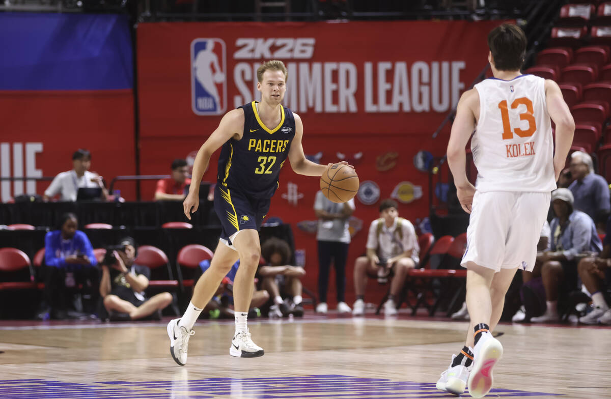 Indiana Pacers forward Buddy Boeheim (32) brings the ball up court against New York Knicks guar ...