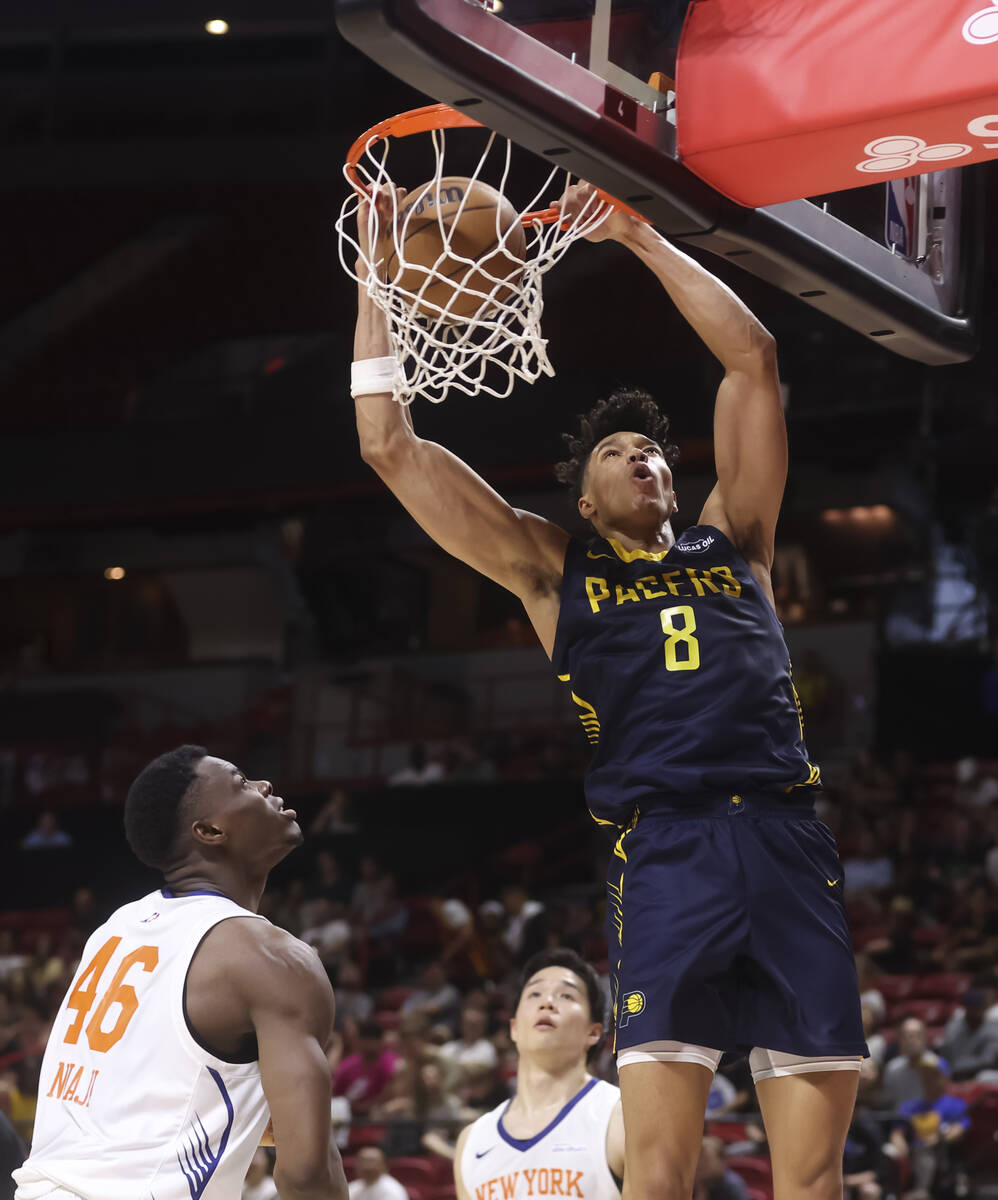 Indiana Pacers forward Enrique Freeman (8) dunks the ball against New York Knicks center James ...