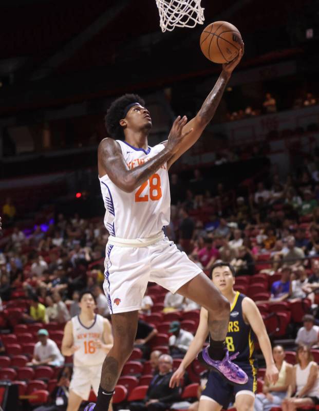 New York Knicks guard Dink Pate (28) lays out the ball against the Indiana Pacers during an NBA ...