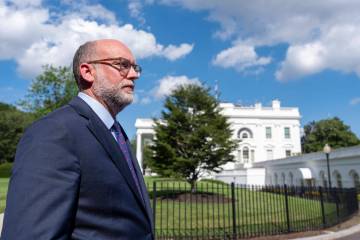 Office of Management and Budget Director Russell Vought walks at the White House, Monday, July ...