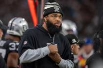 Raiders defensive tackle Christian Wilkins watches from the sideline during the second half of ...