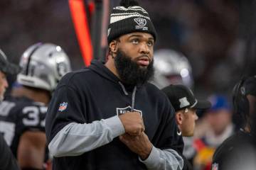 Raiders defensive tackle Christian Wilkins watches from the sideline during the second half of ...