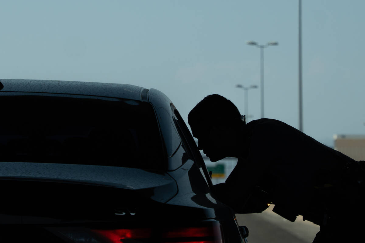 Luis Villanueva, a sworn recruiter with the Nevada Highway Patrol, conducts a traffic stop in L ...