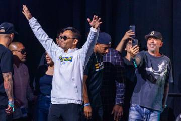 WBC welterweight championship fighter Manny Pacquiao arrives during a ceremonial weigh in for h ...