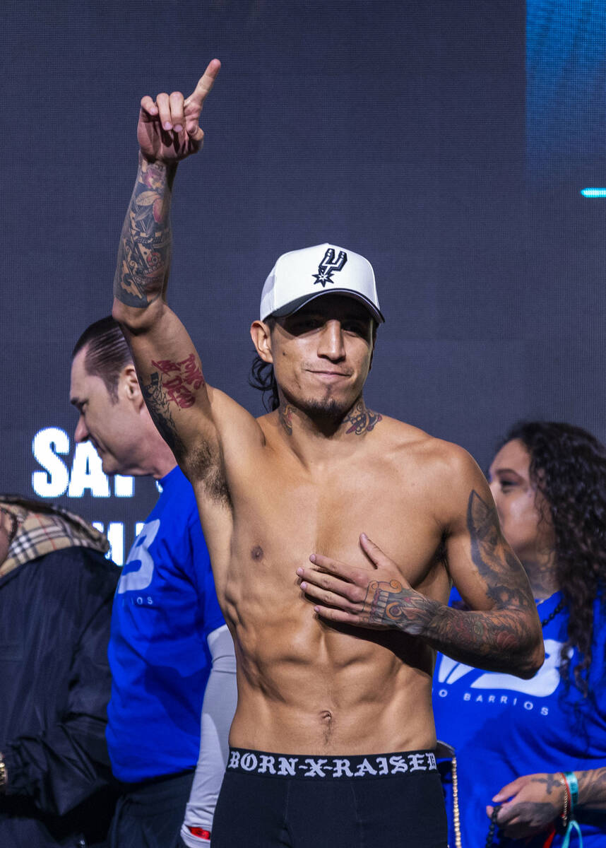 WBC welterweight championship fighter Mario Barrios arrives during a ceremonial weigh in for hi ...