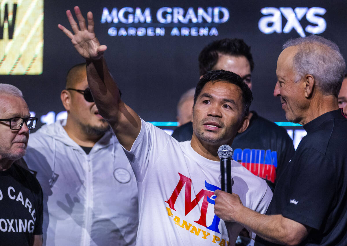 WBC welterweight championship fighter Manny Pacquiao speaks to sports commentator Jim Gray duri ...