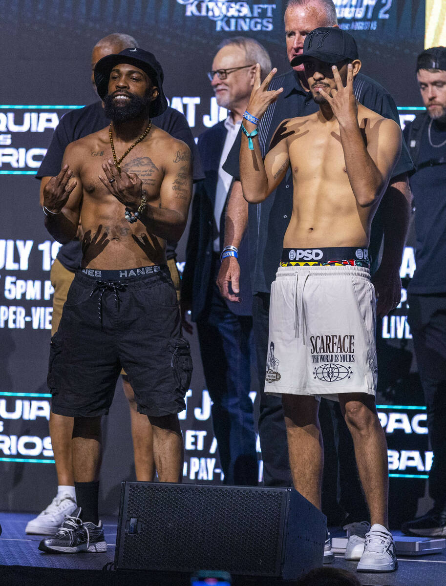 Super featherweight fighters Gary Russell Jr and Hugo Castaneda pose off during the ceremonial ...