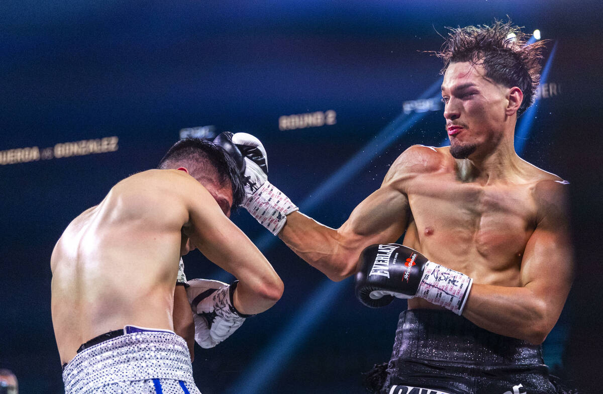 Joet Gonzalez takes punch to the head from Brandon Figueroa during their WBA featherweight titl ...