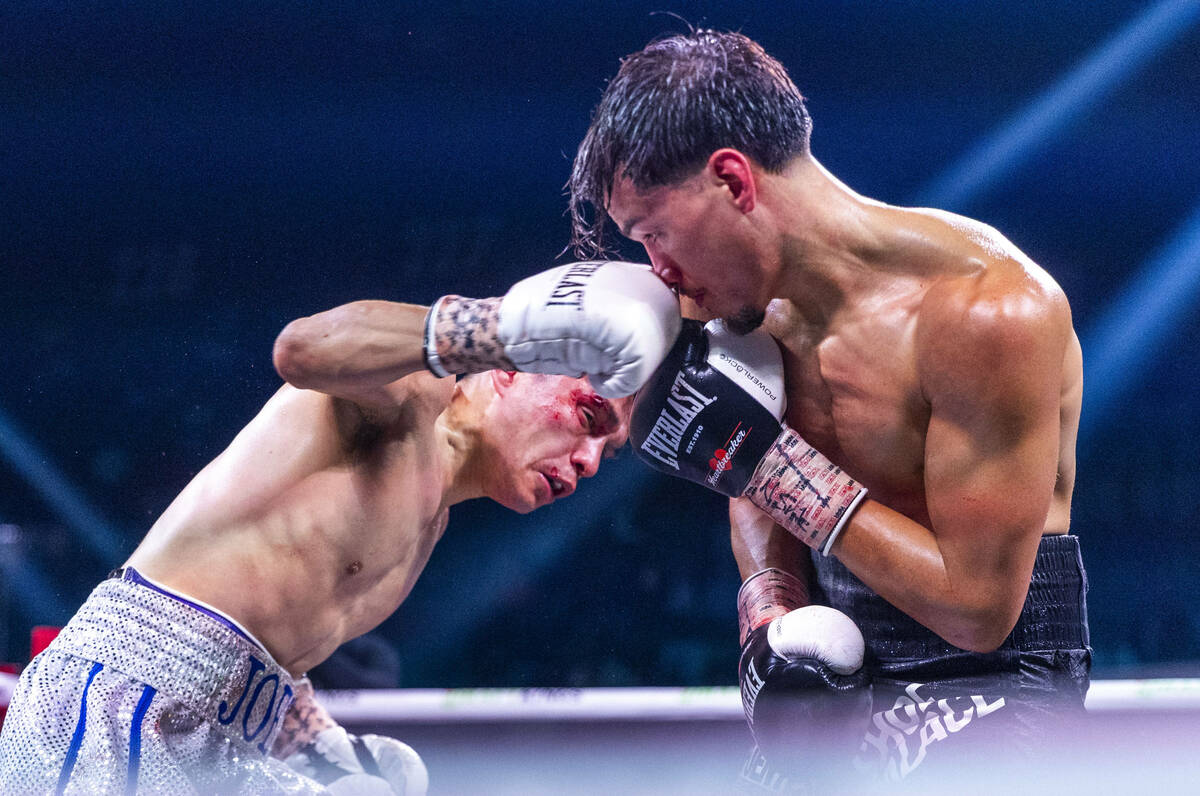 Joet Gonzalez connects with a punch to the nose of Brandon Figueroa during their WBA featherwei ...