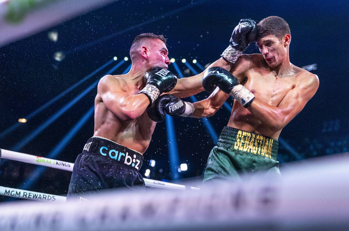 Tim Tszyu catches the forehead of Sebastian Fundora during their WBC super welterweight champio ...
