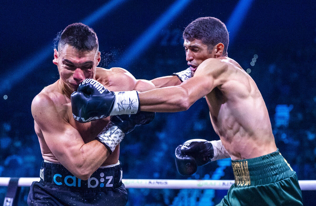 Tim Tszyu will go to the canvas early after a shot from Sebastian Fundora during their WBC supe ...