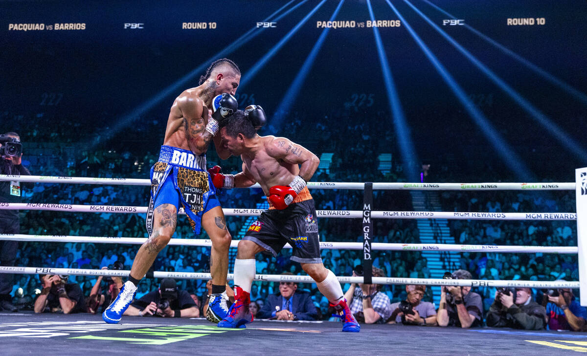 Manny Pacquiao and Mario Barrios battle during their WBC welterweight championship fight at the ...