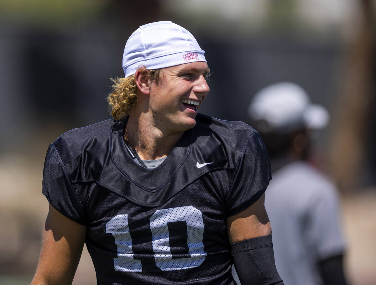 Quarterback Anthony Colandrea (10) looks to teammates during UNLV spring football practice at t ...