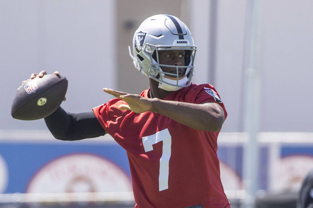Raiders quarterback Geno Smith (7) prepares to throw during an NFL football mandatory minicamp ...