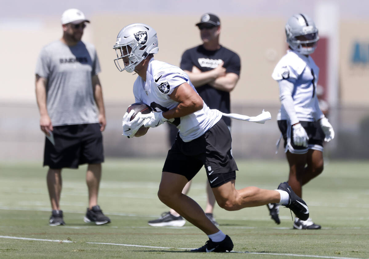 Raiders wide receiver Jack Bech (18) runs with the ball during an NFL mandatory football minica ...