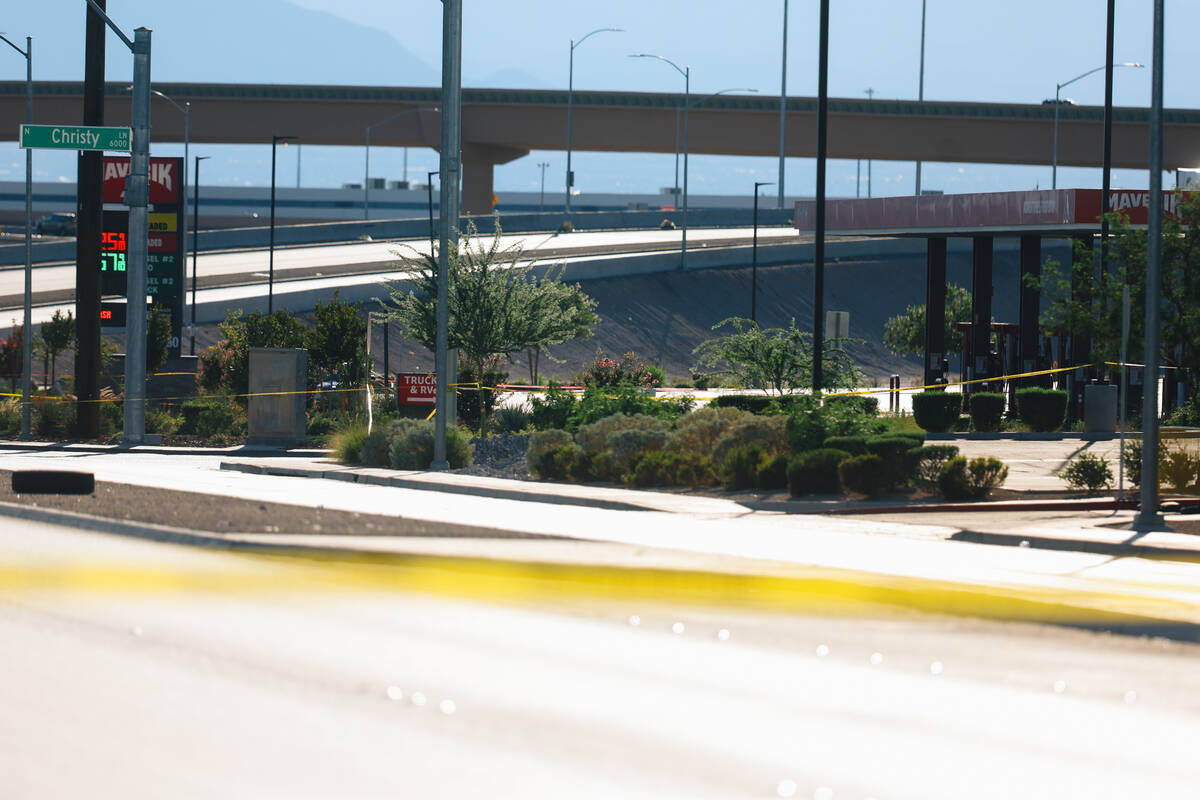 North Las Vegas police tape off a scene to investigate an officer involved shooting at Tropical ...