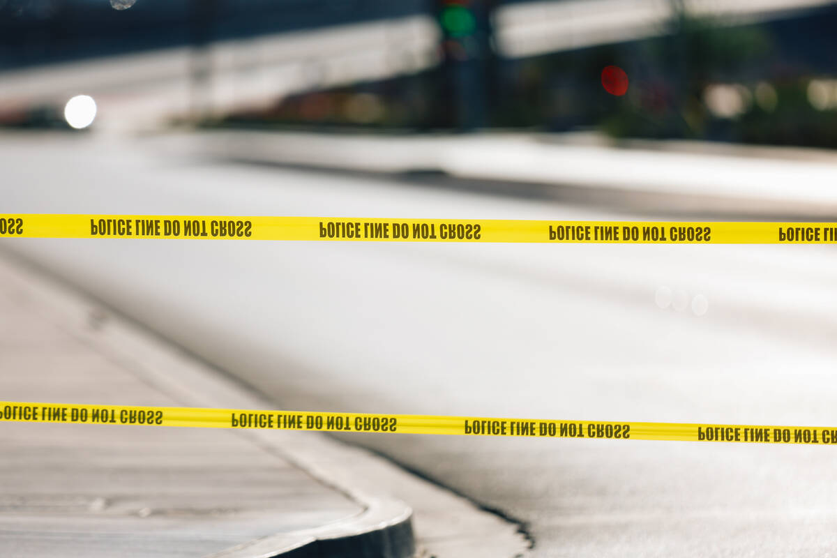 North Las Vegas police tape off a scene to investigate an officer involved shooting at Tropical ...