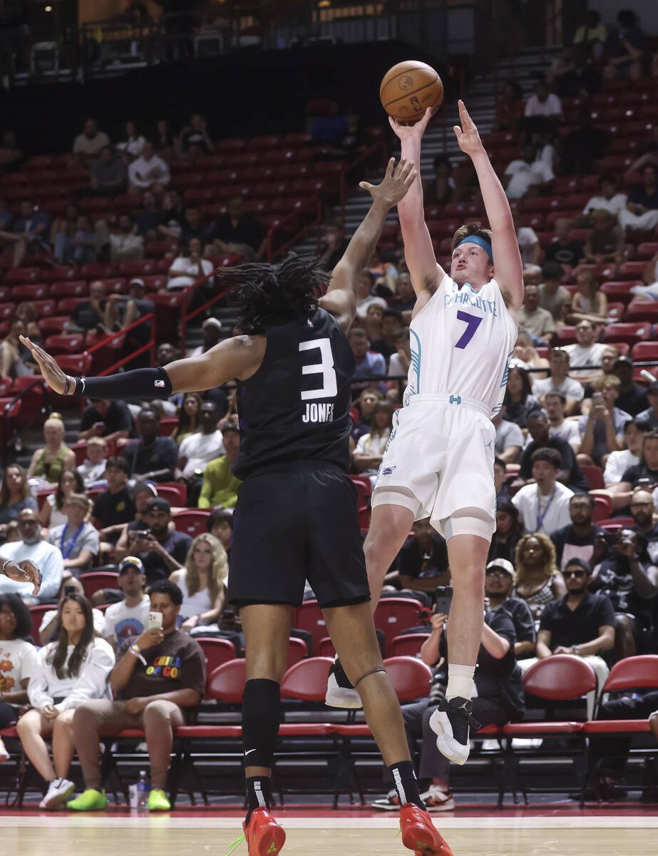 Charlotte Hornets guard/forward Kon Knueppel (7) shoots over Sacramento Kings forward Isaac Jon ...