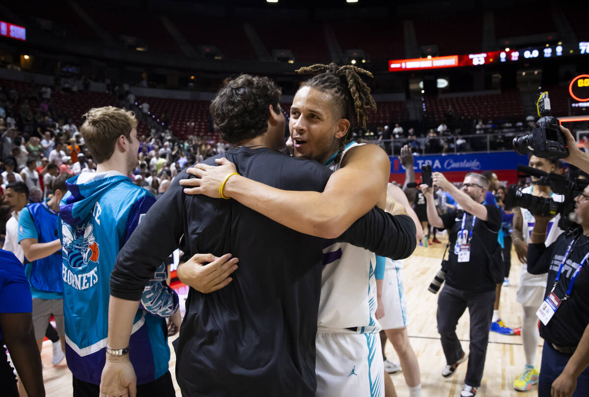 Charlotte Hornets forward/center Josh Oduro (22) celebrates his team’s victory over the ...