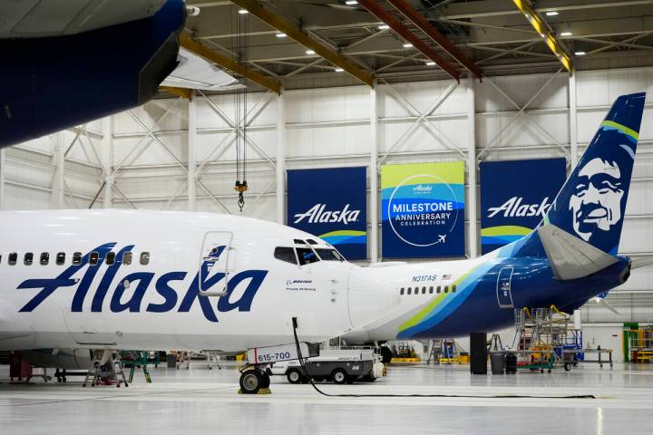 Alaska Airlines aircraft sits in the airline's hangar at Seattle-Tacoma International Airport, ...