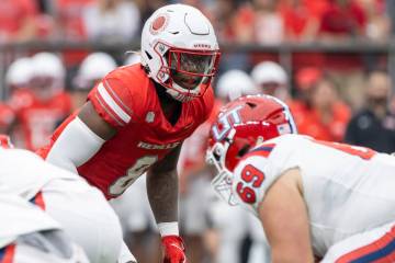 UNLV linebacker Marsel McDuffie (8) waits for the snap during the college football game against ...