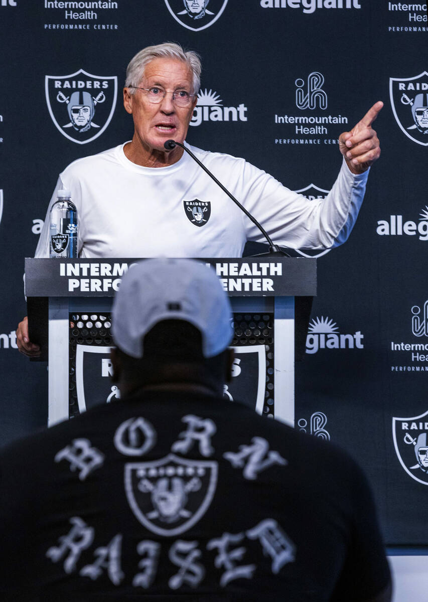 Raiders head coach Pete Carroll responds to a question during a press conference at the Intermo ...