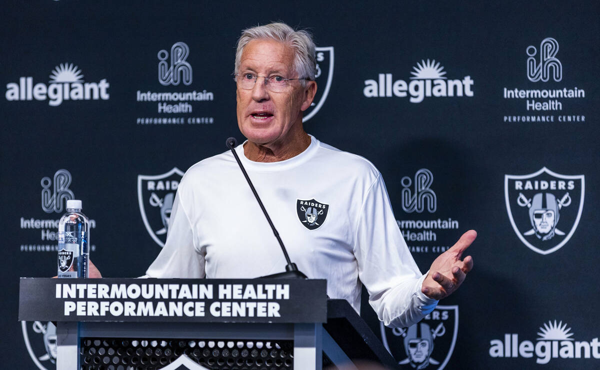 Raiders head coach Pete Carroll responds to a question during a press conference at the Intermo ...