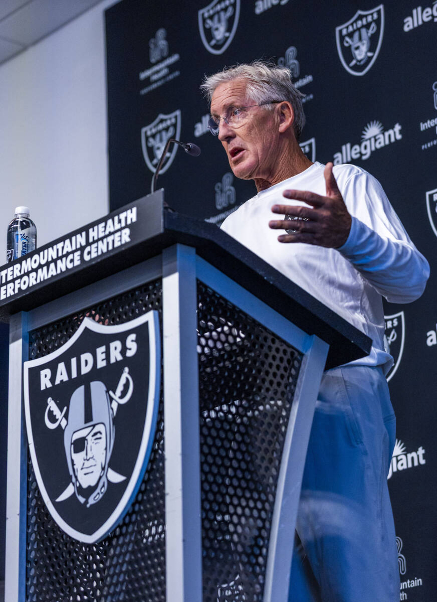 Raiders head coach Pete Carroll responds to a question during a press conference at the Intermo ...