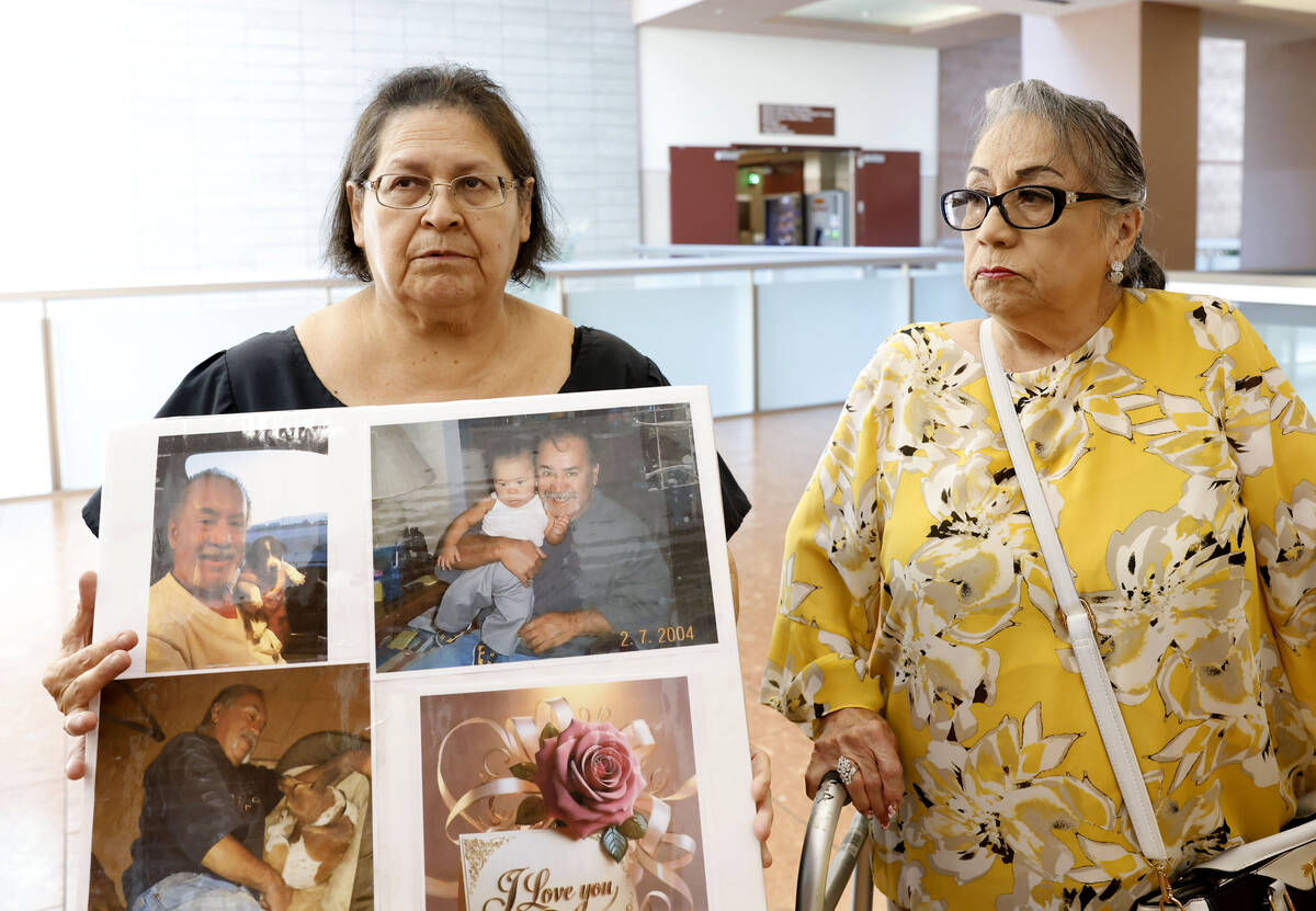 Pauline Ureño holds photographs of her late husband Ricardo as her sister-in-law looks on duri ...