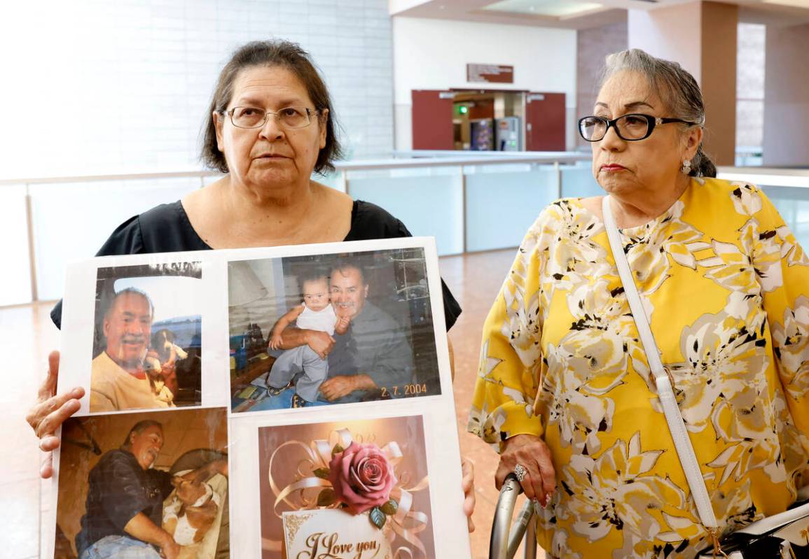 Pauline Ureño holds photographs of her late husband Ricardo as her sister-in-law looks on duri ...