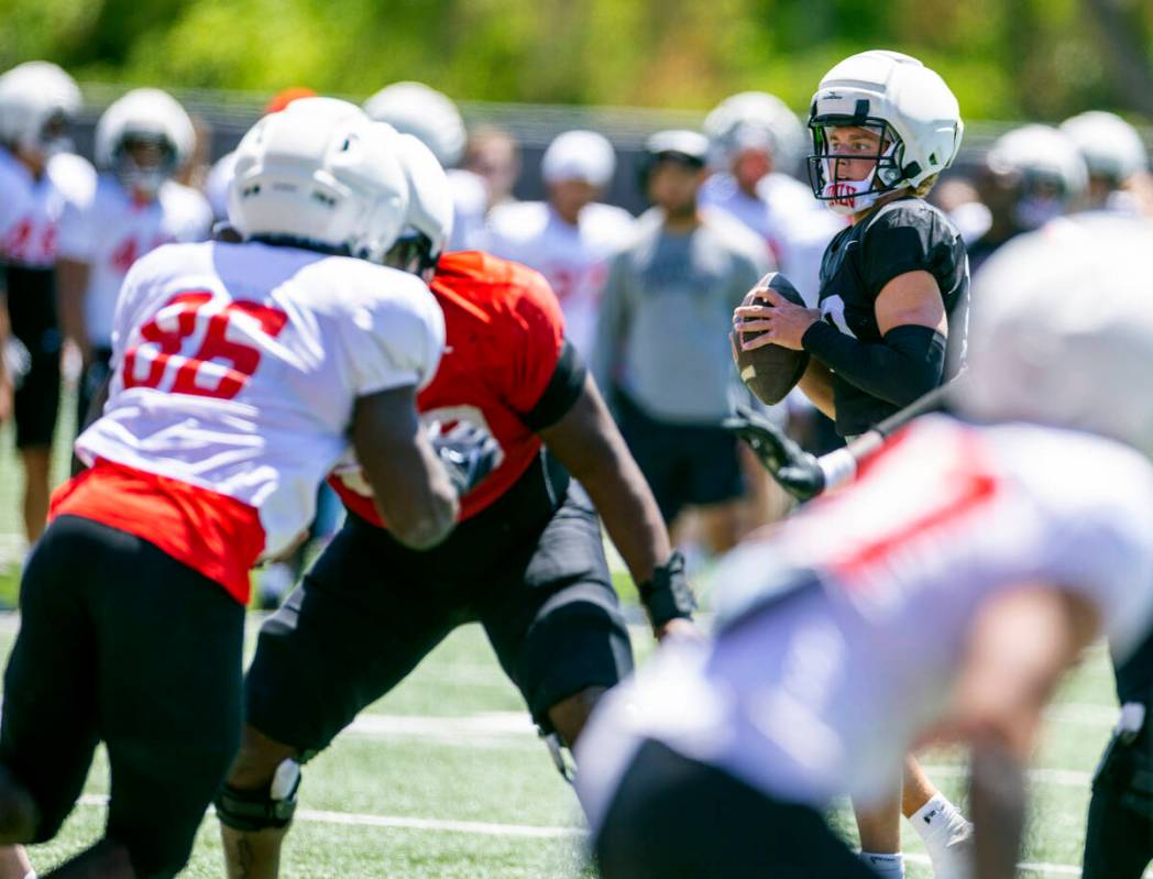 Quarterback Anthony Colandrea (10) looks to pass up the field during UNLV spring football pract ...