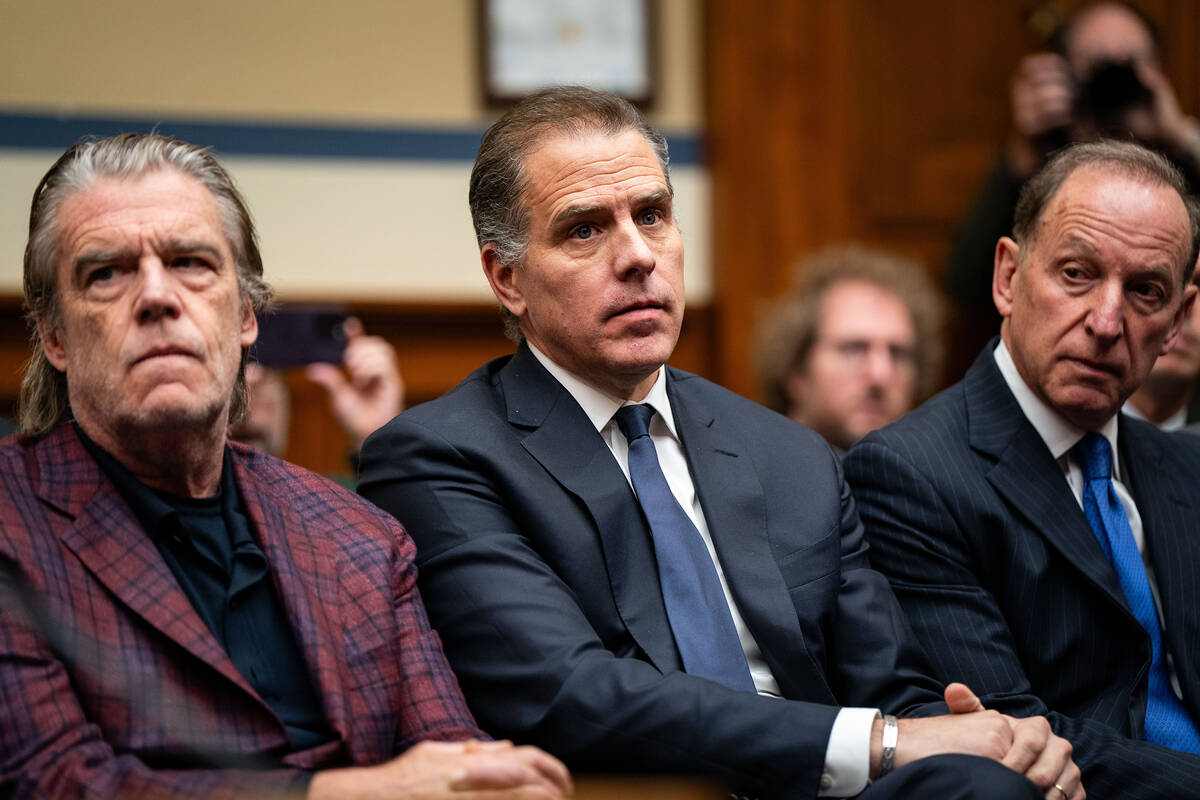 Hunter Biden, son of U.S. President Joe Biden, flanked by Kevin Morris, left, and Abbe Lowell, ...