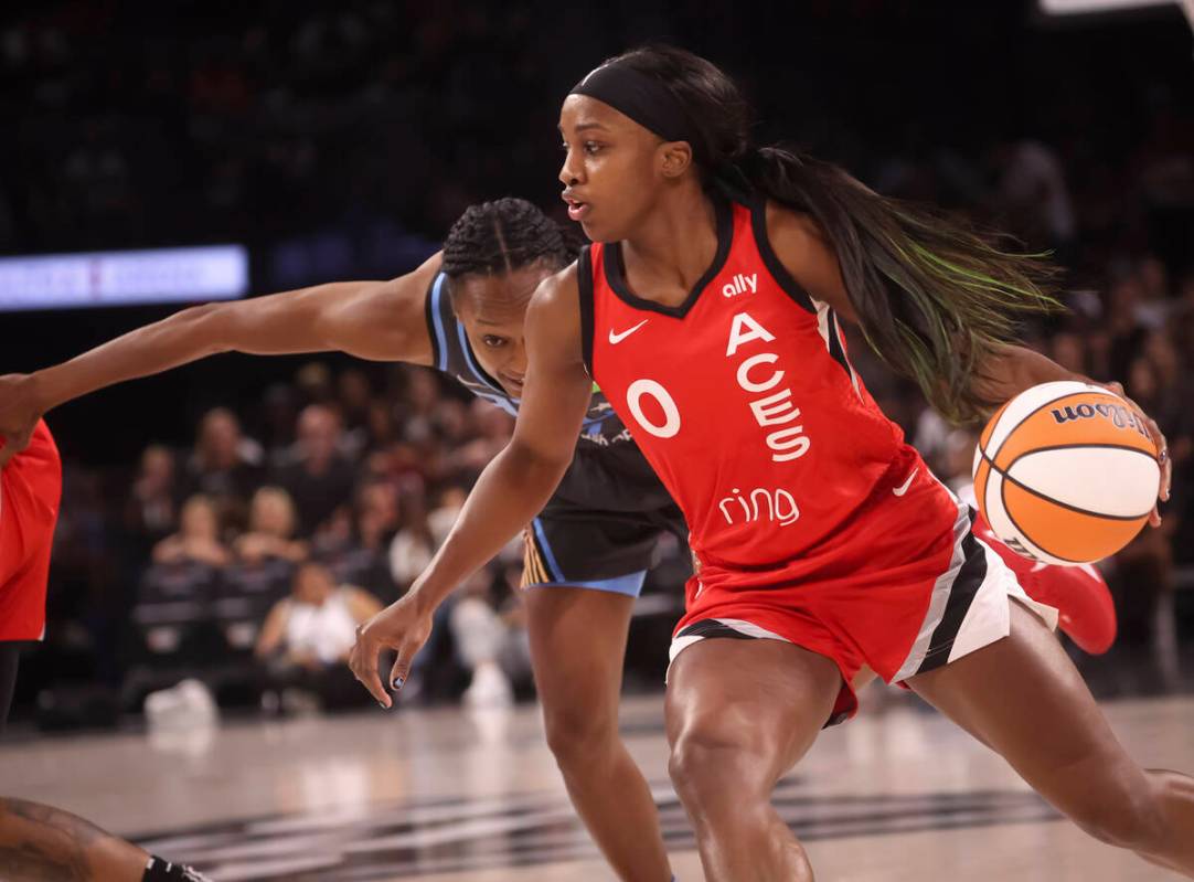 Aces guard Jackie Young (0) brings the ball up court under pressure from Atlanta Dream guard Sh ...