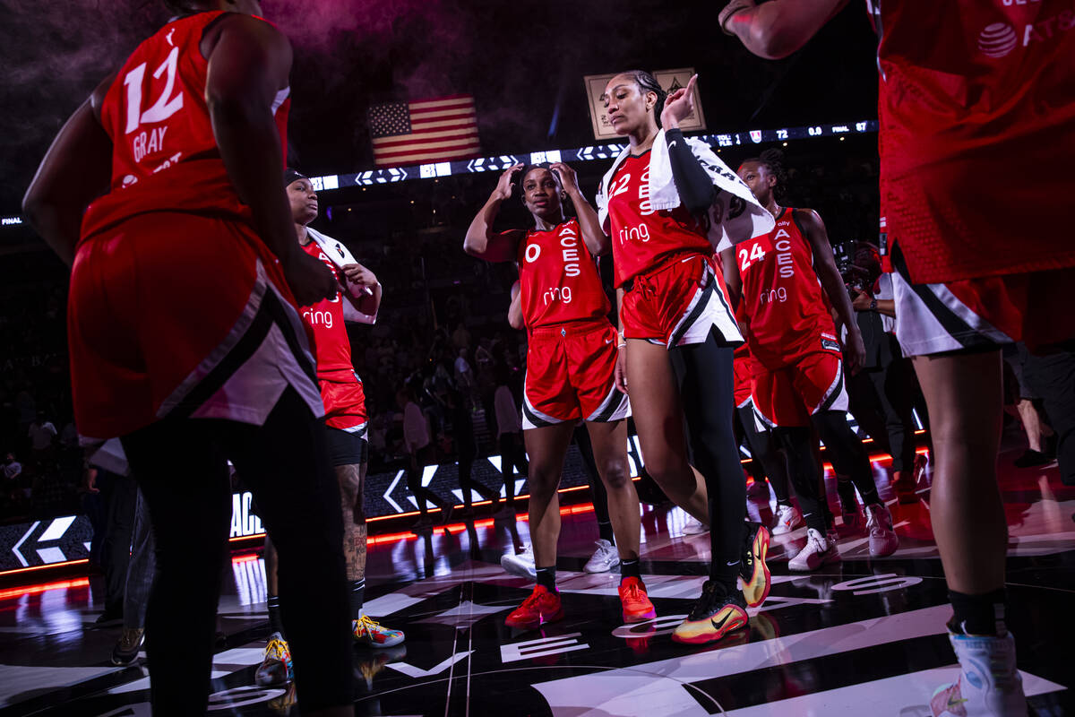 Aces center A'ja Wilson, center right, celebrates with teammates after defeating the Atlanta Dr ...