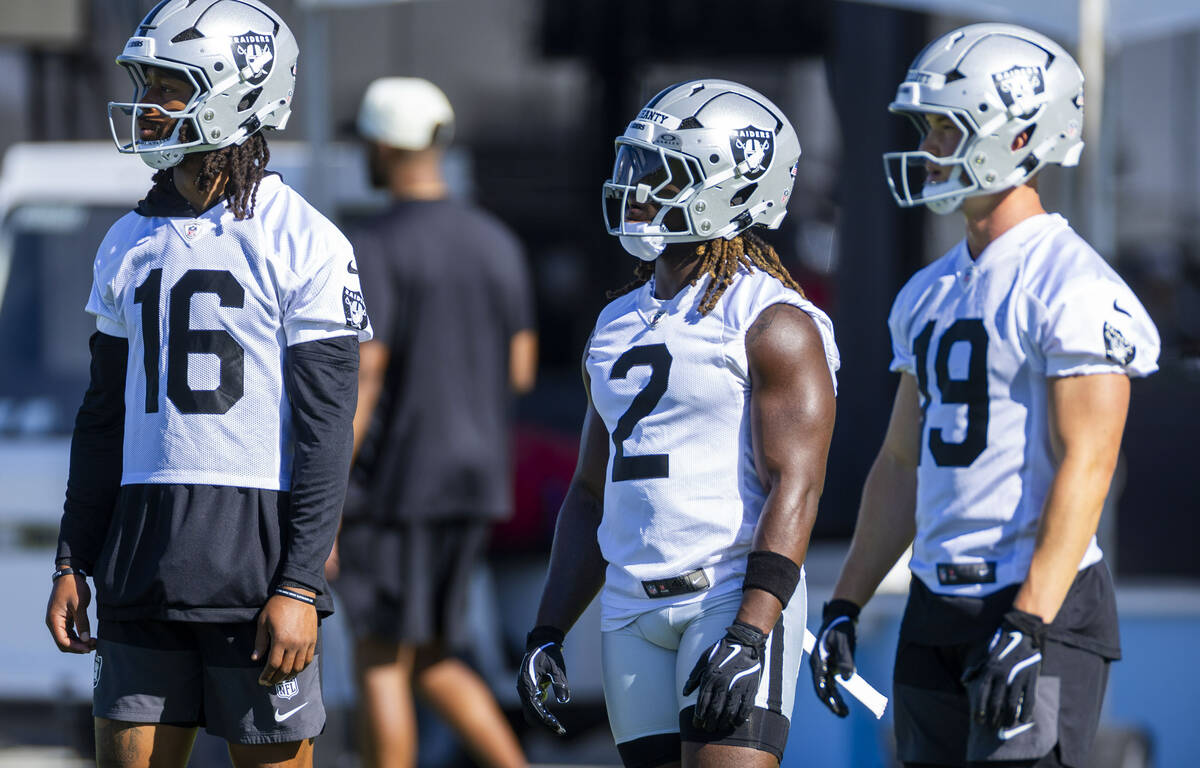 Raiders wide receiver Jacob Meyers (16), Ashton Jeanty (2) and wider receive Tommy Mellott (19) ...