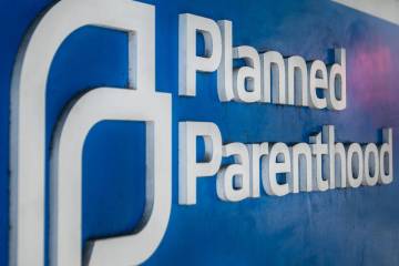 Morning light shines on the entrance sign at a Planned Parenthood clinic in Walnut Creek, Calif ...