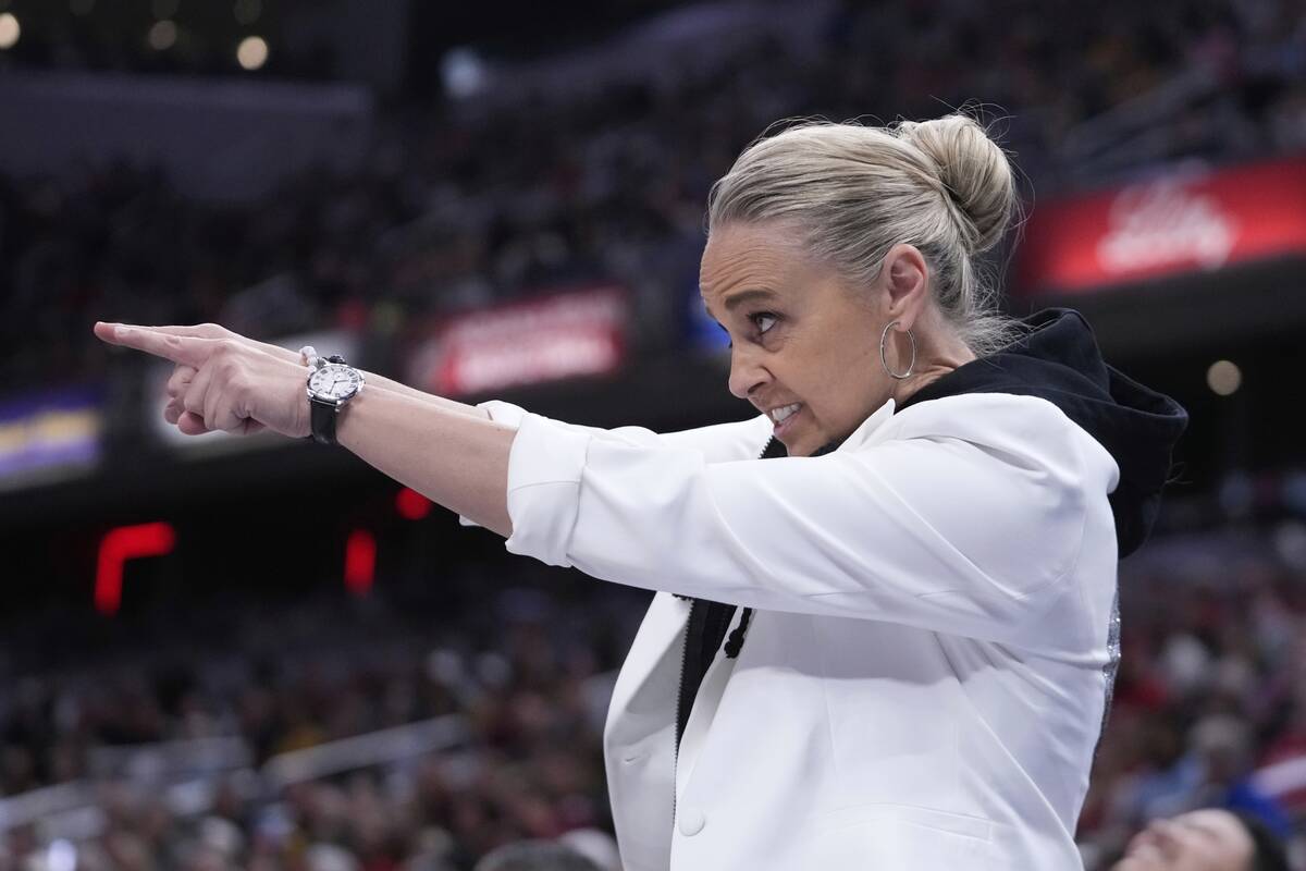Las Vegas Aces Head Coach Becky Hammon argues a call during the first half of a WNBA basketball ...