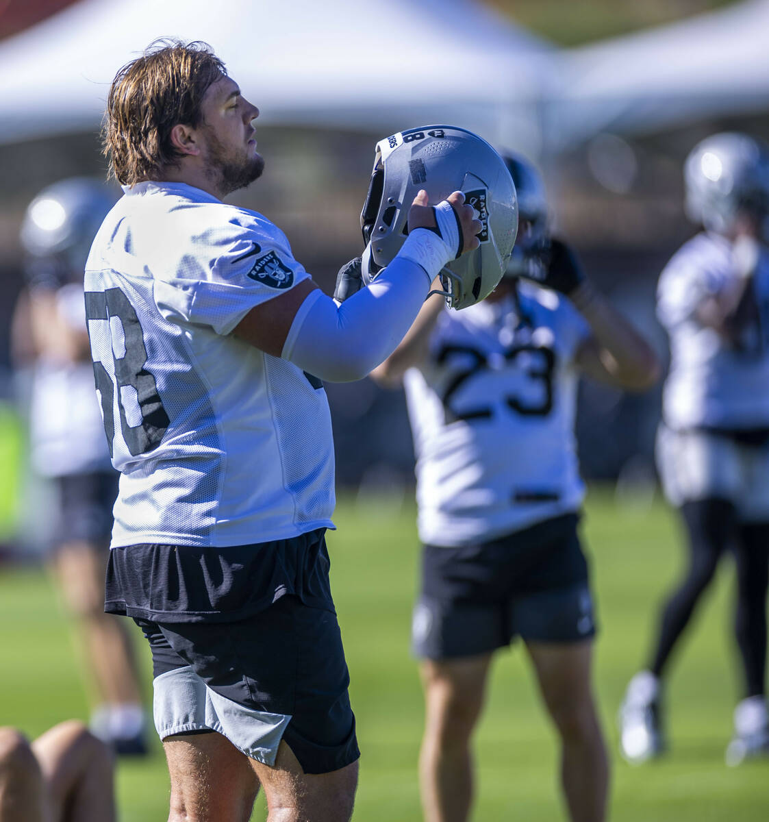 Raiders guard Jackson Powers-Johnson (58) readies for drills on the second day of training camp ...