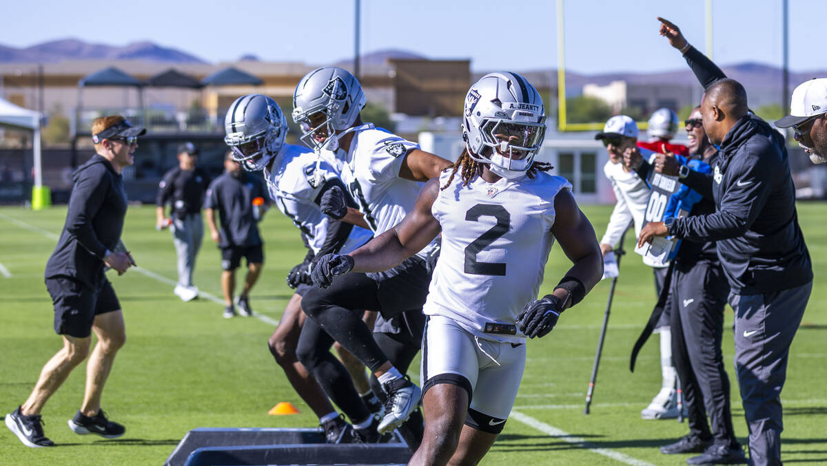 Raiders running back Ashton Jeanty (2) runs a drill with teammates on the second day of trainin ...