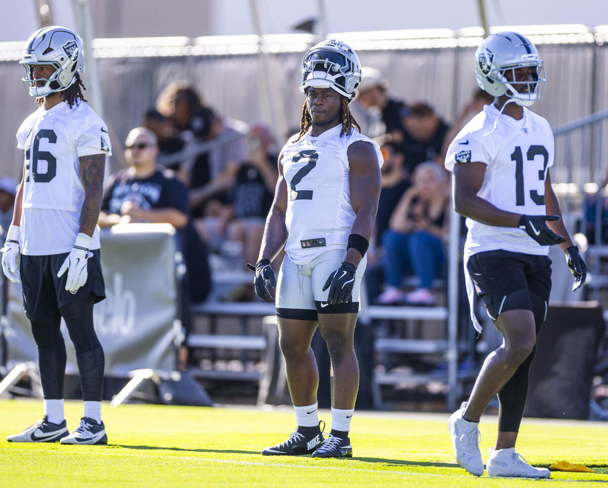 Raiders wide receiver Jakobi Meyers (16), running back Ashton Jeanty (2) and wide receiver Phil ...