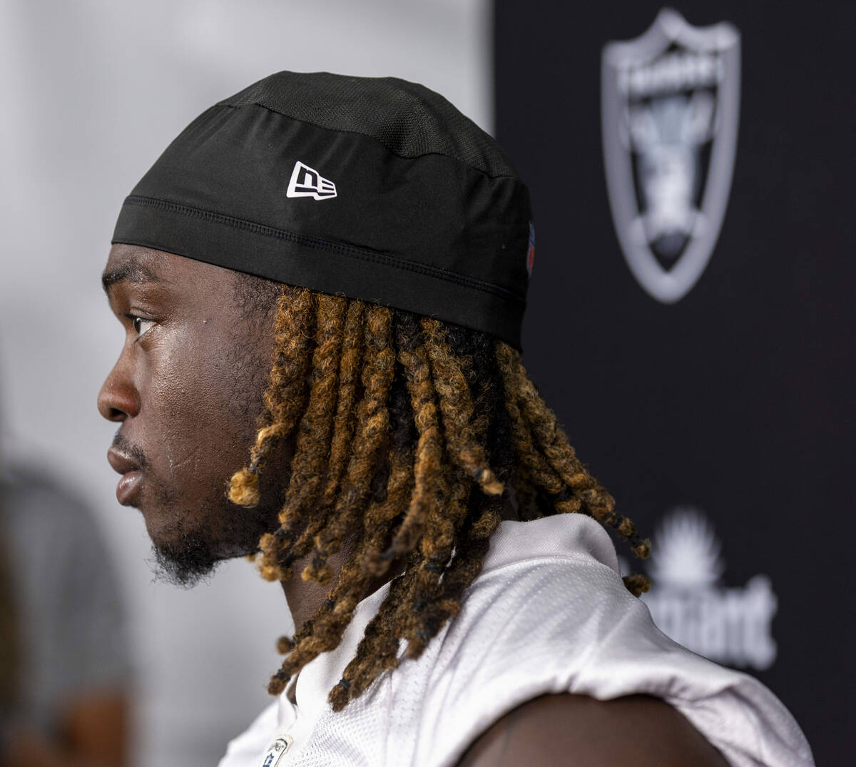 Raiders running back Ashton Jeanty (2) listens to a question during an interview on the second ...