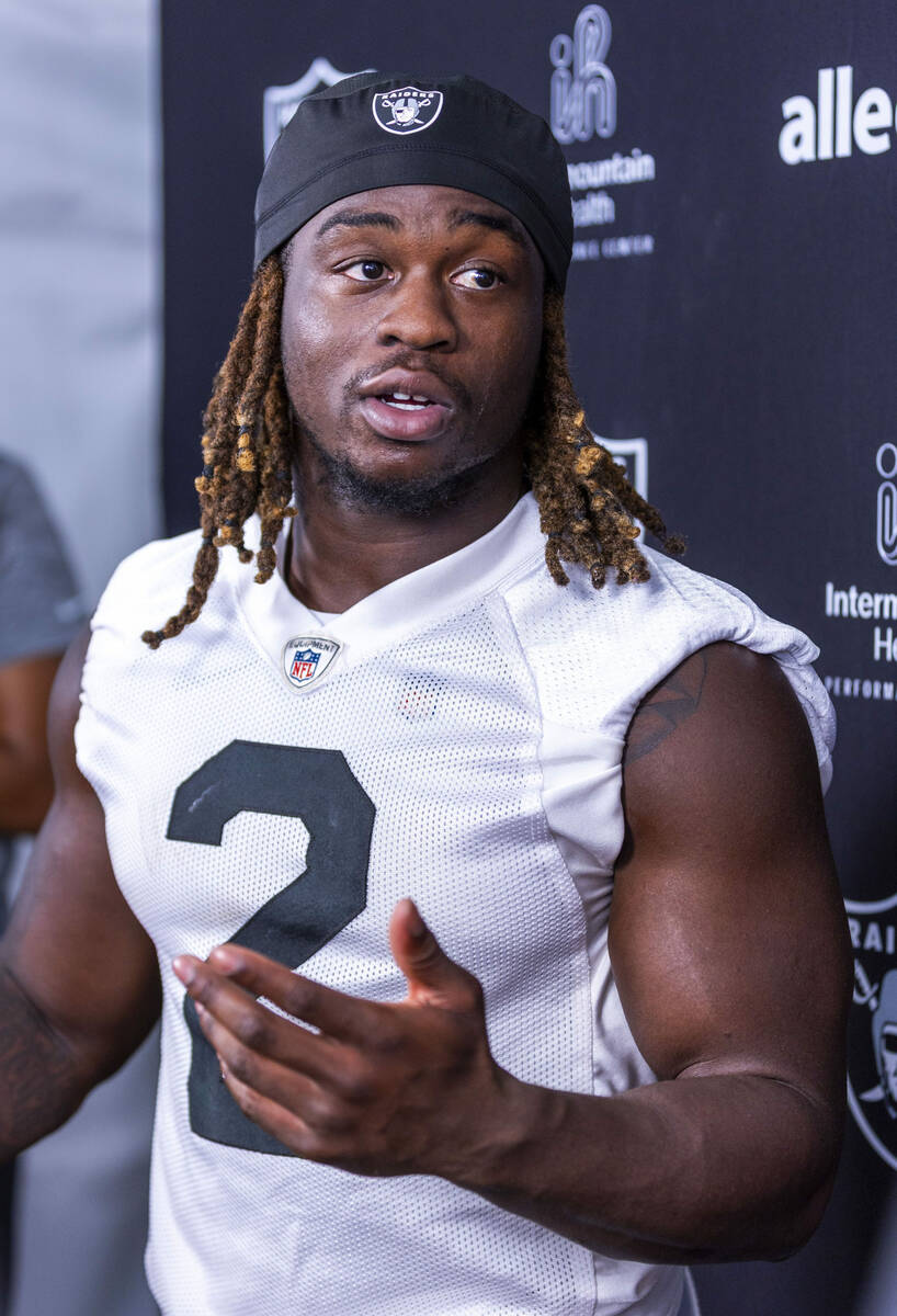Raiders running back Ashton Jeanty (2) answers a question during an interview on the second day ...