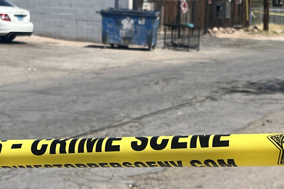 Police investigate the discovery of a deceased dog found in a crate next to a dumpster near the ...